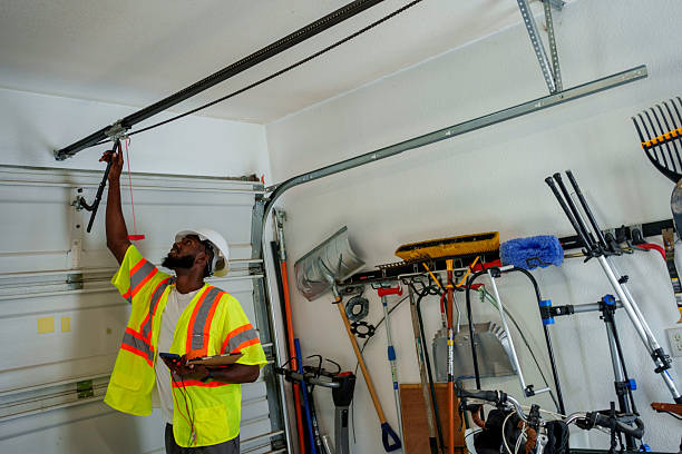 Professional Garage Door Roller Replacement technician working in Plainview, NY